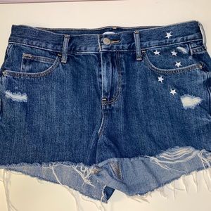 Old navy blue jean shorts w/ stars